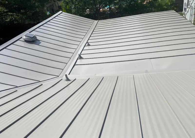 Solar attic fan installed on a metal roof for Roof Ventilation in La CaÃ±ada Flintridge